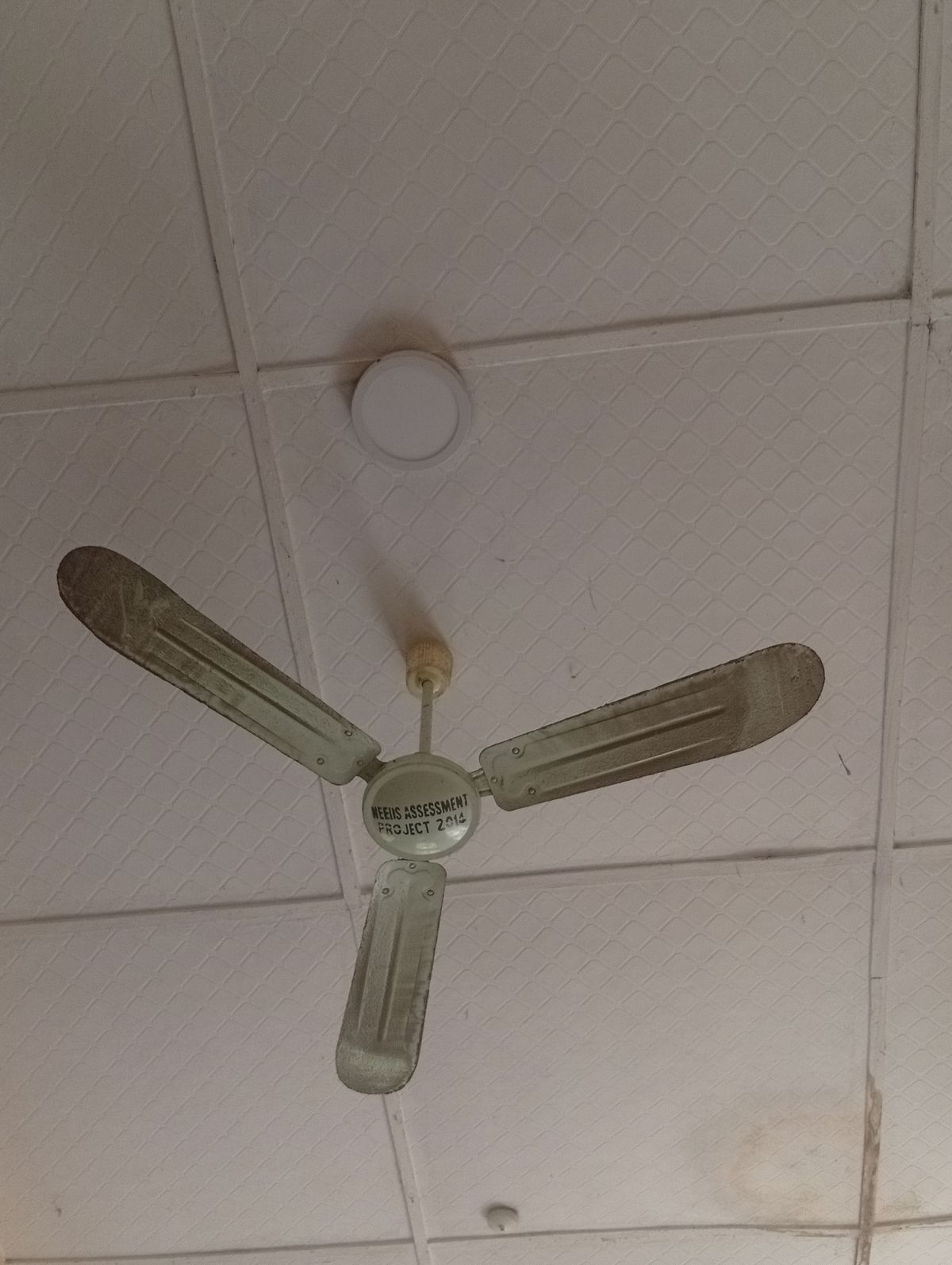 Ceiling fan installed and mounted to a bedroom ceiling