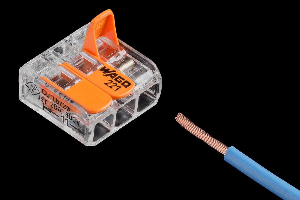 Electrical wire spliced into a connector during a wiring installation